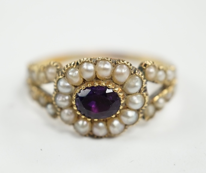 A Victorian yellow metal amethyst and seed pearl cluster set ring, size P/Q, gross weight 3 grams. Condition - poor